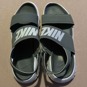 Nike sandals. Size 9. Gray in color.